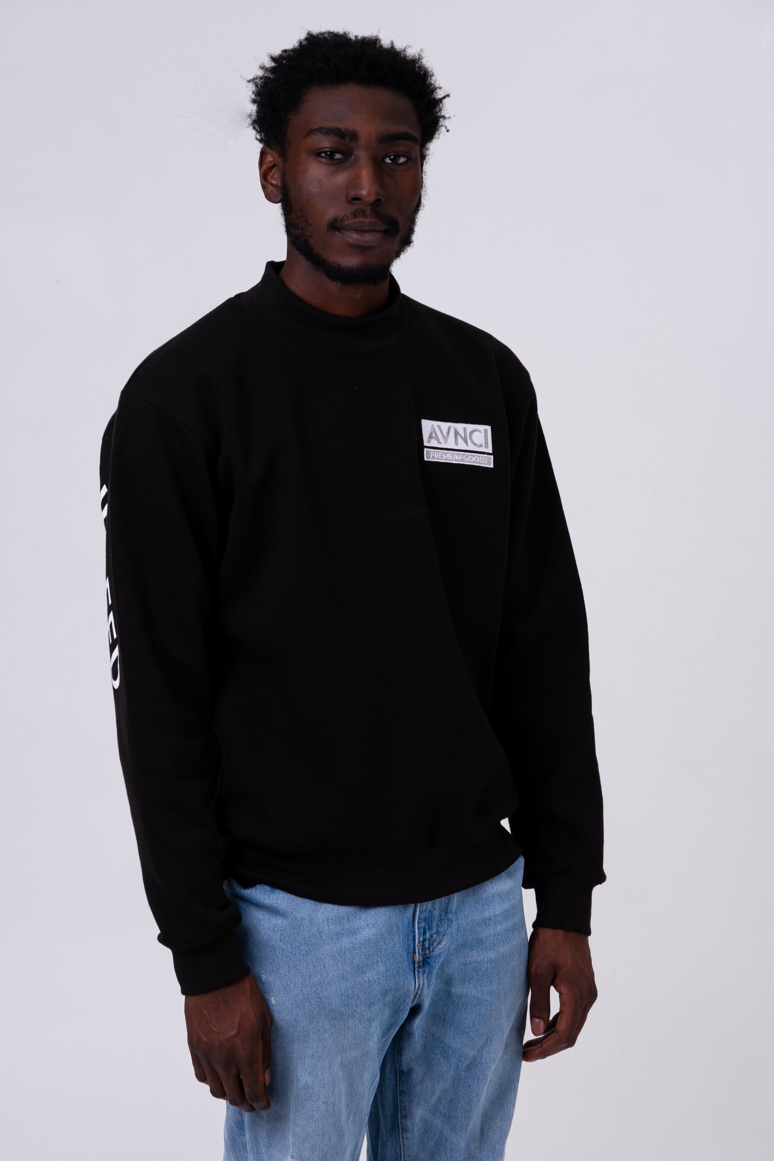AVNCI Mock-neck Embroidered Sweater